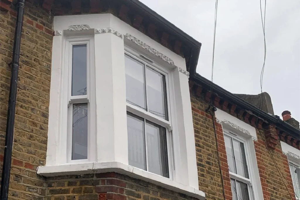 uPVC Sliding Sash Windows - Ashe Windows uPVC sliding sash windows in traditional house