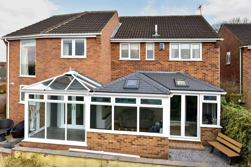 Conservatory with warm roof and large skylight windows