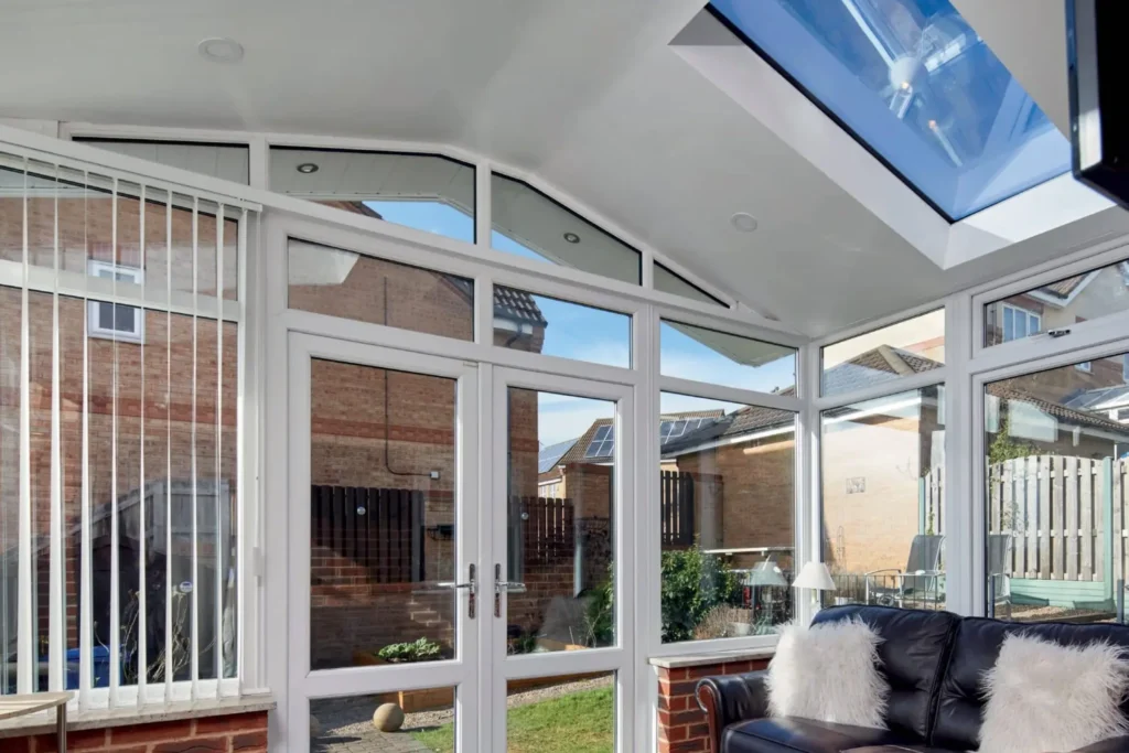 Interior of conservatory with warm roof and large skylight window